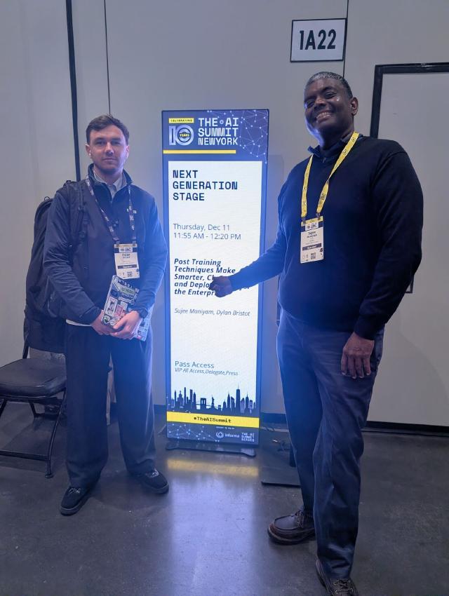 Sujee Maniyam and Dylan Bristot in front of the Next Generation Stage sign at AI Summit New York 2025